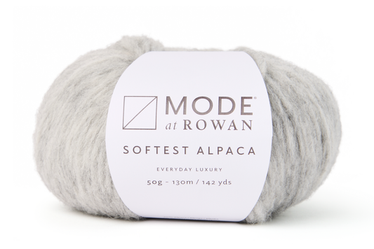 ball of light grey yarn with mode at rowan label on a white background.