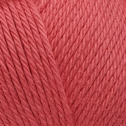 close up of bright pink cotton yarn ball.