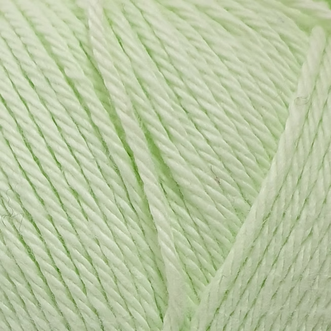 close up of light green cotton yarn. 