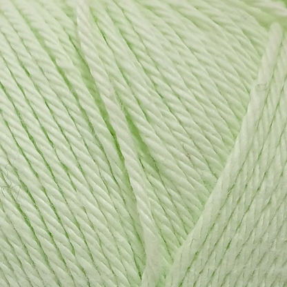 close up of light green cotton yarn. 