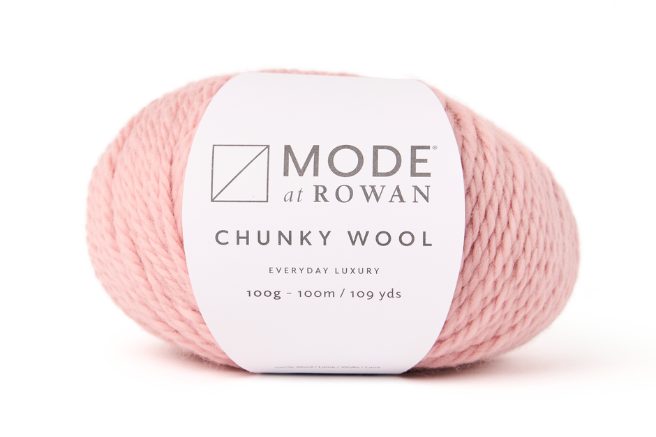 ball of pink chunky wool with mode at rowan label. on a plain white background.