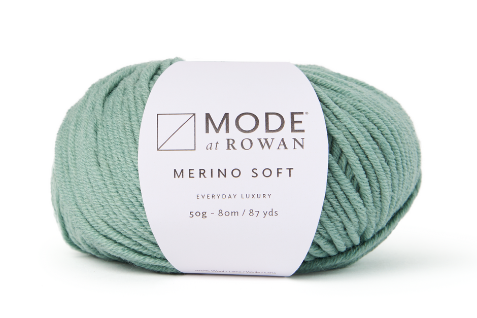 green ball of yarn with mode at rowan label on a plain white background.