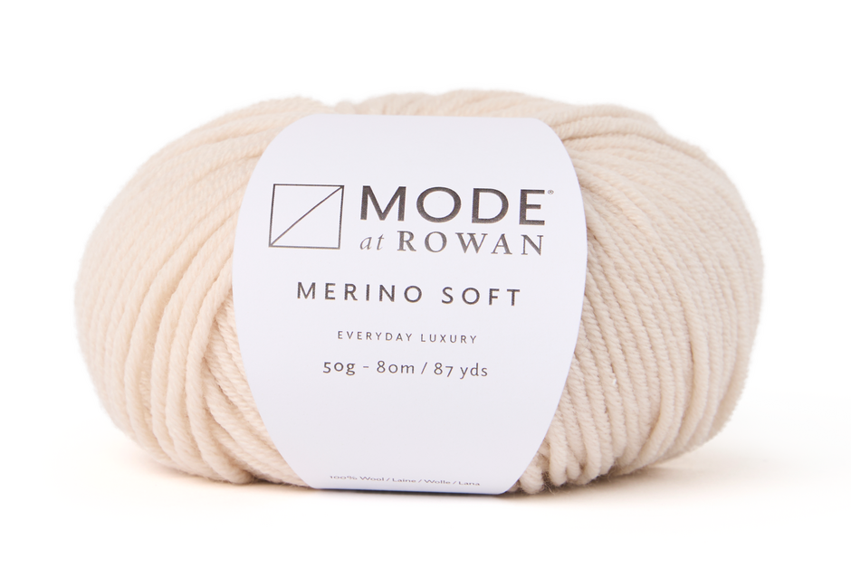 cream yarn with mode at rowan label with grey writing and plain white background.