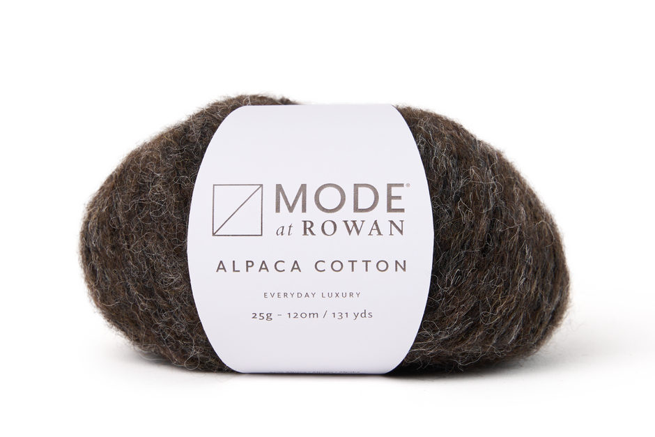dark brown ball of yarn on a plain white background with a mode at rowan label and grey writing.