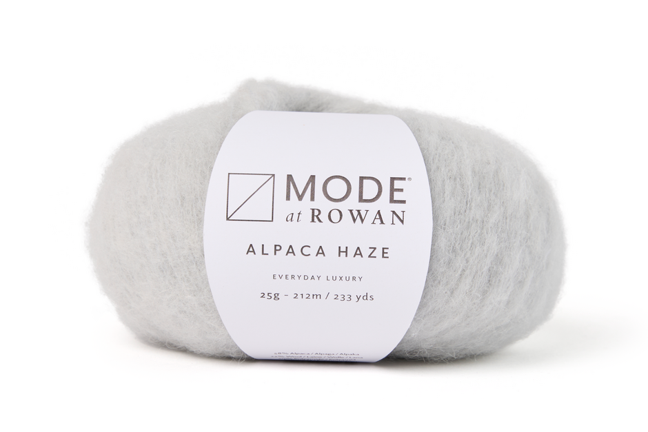 grey fluffy yarn with plain white background and a mode at rowan label with grey writing.