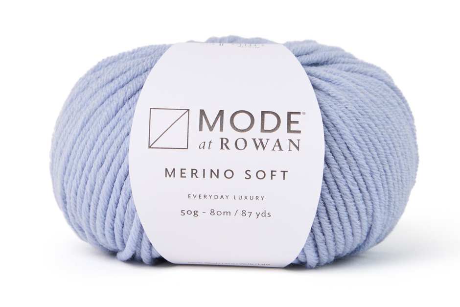 ball of light blue yarn with mode at rowan label with grey writing on a white background.