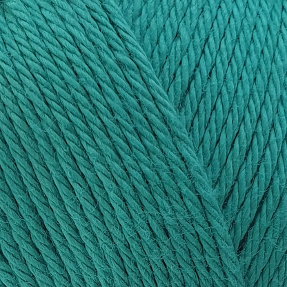 close up of teal blue cotton yarn.