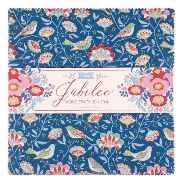 A fabric stack of 10" x 10" squares by Tilda  with a floral and bird pattern on a blue background, photographed against a white background.