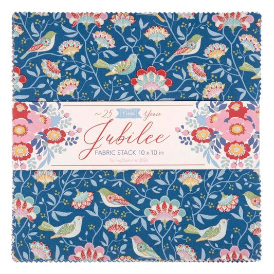 A fabric stack of 10" x 10" squares by Tilda  with a floral and bird pattern on a blue background, photographed against a white background.