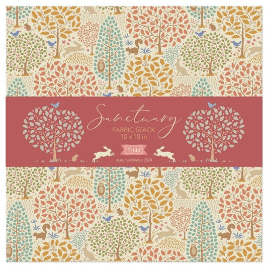 A fabric stack of 10" x 10" squares by Tilda  with an autumn woodland pattern with trees, birds, squirrels, and rabbits in muted colours of beige, orange, teal, and brown, photographed against a white background.  