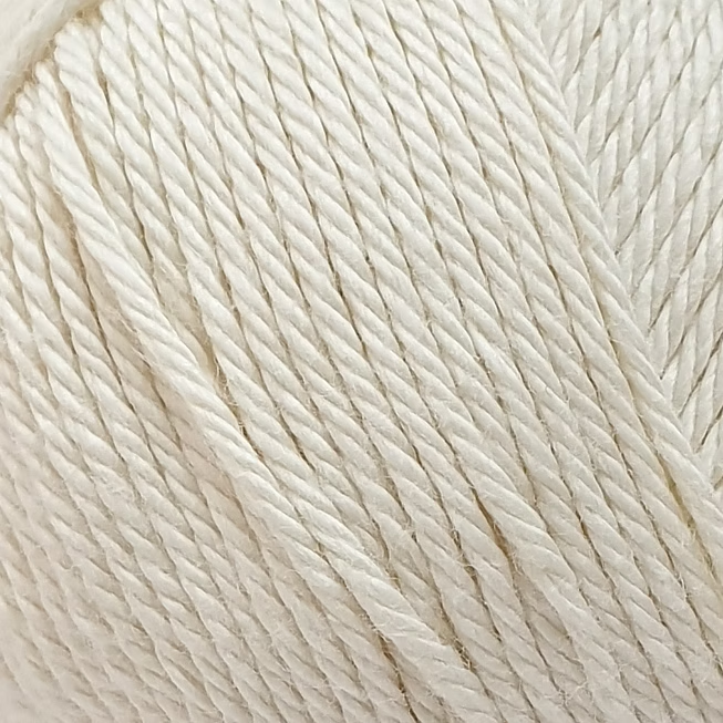 close up of cream coloured yarn ball.