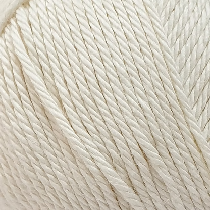 close up of cream coloured yarn ball.