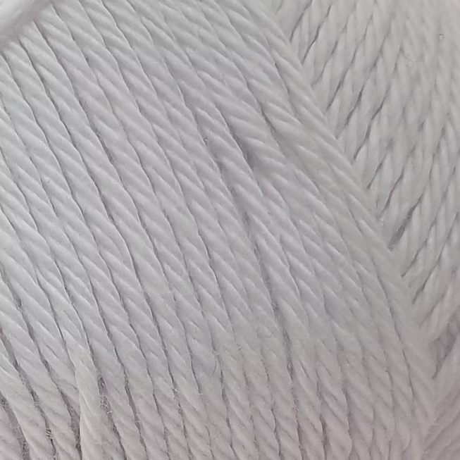 close up of white cotton yarn ball.   
