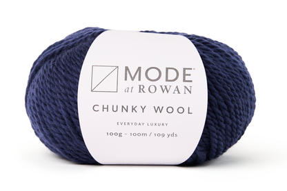 dark blue ball of yarn with mode at rowan label on a white background.