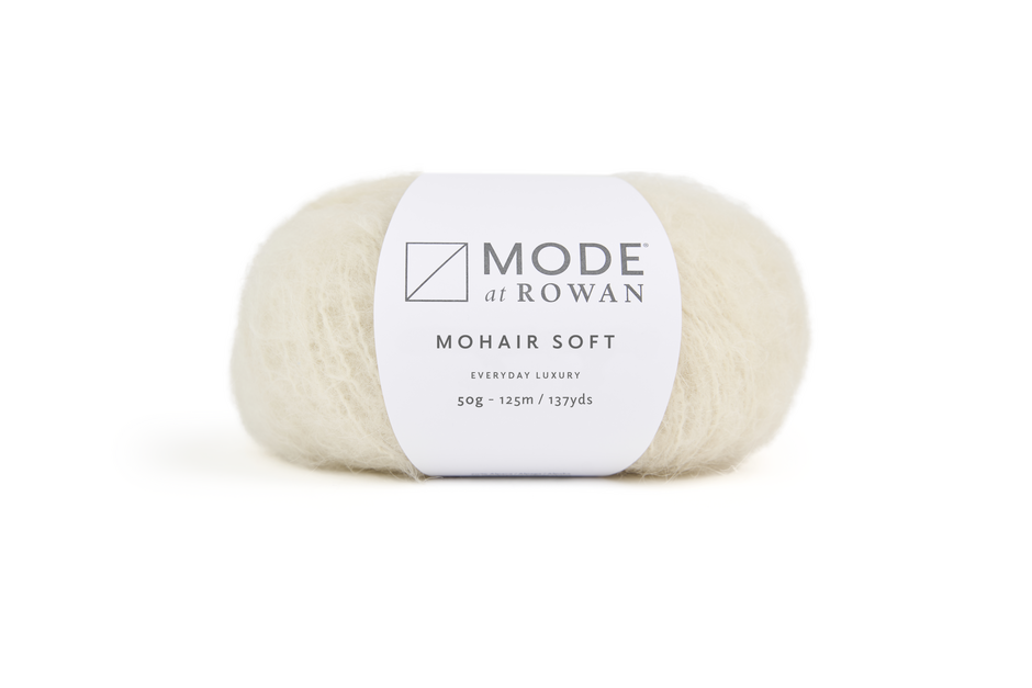 ball of white yarn with mode at rowan  label with grey writing on a plain white background.