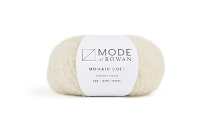 ball of white yarn with mode at rowan  label with grey writing on a plain white background.