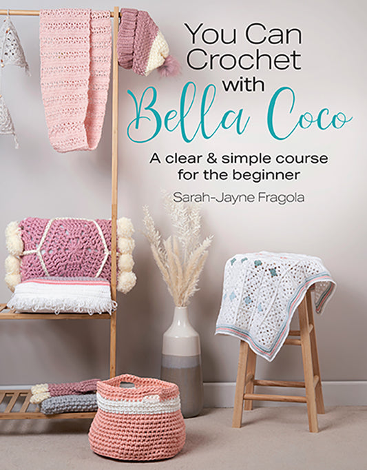 Book cover of 'You Can Crochet with Bella Coco' featuring crocheted items on a wooden rack.