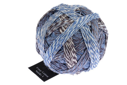 Image shows wound ball of Schoppel  Crazy Cotton 4ply/sock.  The colour is sea and more with shades of blue, grey and cream.